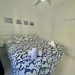Apartamento bajo con jardín y piscina - FORCAT.