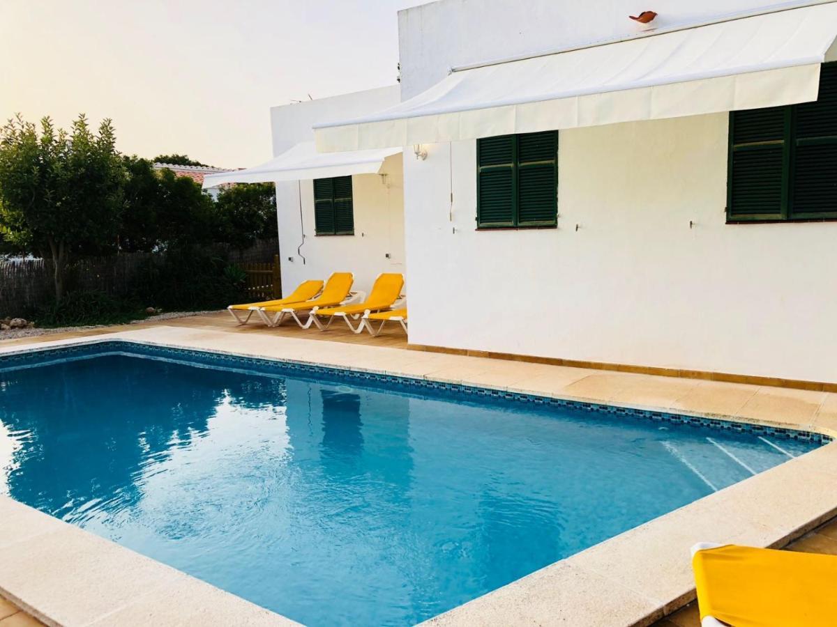 Casa Con Piscina Compartida En Addaia Holiday home